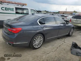 2017 BMW 7 Series 740i xDrive with VIN WBA7E4C32HGU99963, listed as a Copart auction lot 65848354 with 99,396 mi miles and Salvage Title. Bid and sale history available at carsss.com. Image 3.