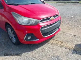 2016 Chevrolet Spark LT with VIN KL8CD6SA7GC638841, listed as a IAAI auction lot 42140920 with 160,005 mi miles and . Bid and sale history available at DreamBid. Image 12.