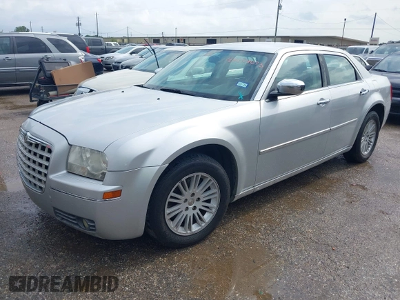2010 Chrysler 300 Touring with VIN 2C3CA5CV1AH272993, listed as a IAAI auction lot 42154073 with 224,685 mi miles and . Bid and sale history available at DreamBid. Image 2.