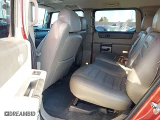2004 Hummer H2 with VIN 5GRGN23U24H104618, listed as a IAAI auction lot 41972937 with 106,181 mi miles. Bid and sale history available at carsss.com. Image 8.