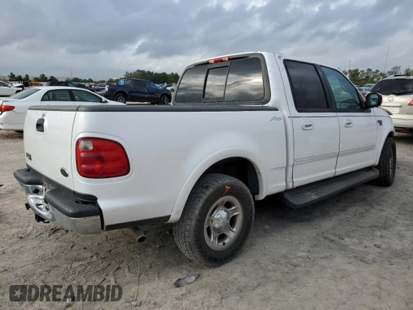 2001 Ford F-150 XLT with VIN 1FTRW07L01KC60815, listed as a Copart auction lot 87022424 with 205,304 mi miles and Salvage title. Bid and sale history available at DreamBid. Image 3.