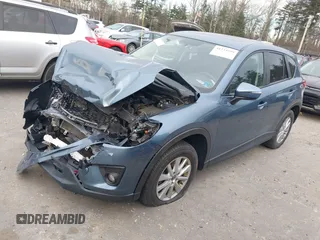 2015 Mazda CX-5 Touring with VIN JM3KE4CY1F0545305, listed as a IAAI auction lot 41234599 with 92,791 mi miles. Bid and sale history available at carsss.com. Image 19.