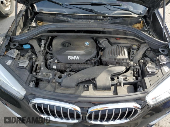 2017 BMW X1 xDrive28i with VIN WBXHT3C32H5F71690, listed as a Copart auction lot 60852375 with 67,475 mi miles and Salvage title. Bid and sale history available at DreamBid. Image 12.