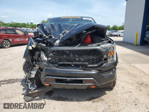 2021 Ford F-150 XL with VIN 1FTFW1E52MFB31825, listed as a Copart auction lot 61462735 with 76,653 mi miles and Salvage title. Bid and sale history available at DreamBid. Image 5.