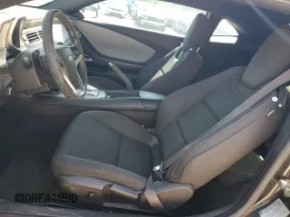 2012 Chevrolet Camaro 2LS z VIN 2G1FA1E37C9203566, wystawiony jako Copart lot #52959205 z przebiegiem 171 482 mil mil oraz Szkoda całkowita • Salvage title. Historia ofert i sprzedaży dostępna na DreamBid. Obrazek 7.
