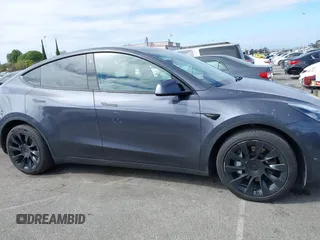 2021 Tesla Model Y Long Range with VIN 5YJYGDEE6MF209034, listed as a IAAI auction lot 41896238 with 53,401 mi miles. Bid and sale history available at carsss.com. Image 14.