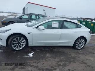 2018 Tesla Model 3 Long Range Battery with VIN 5YJ3E1EB2JF089006, listed as a IAAI auction lot 41186372 with Not Provided miles and . Bid and sale history available at DreamBid. Image 13.