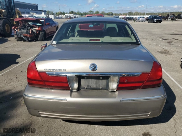 2003 Mercury Grand Marquis GS Convenience with VIN 2MEFM74WX3X707679, listed as a Copart auction lot 73963754 with 75,143 mi miles and Salvage Title. Bid and sale history available at carsss.com. Image 6.