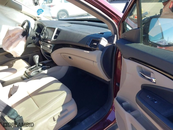 2019 Honda Ridgeline RTL-E with VIN 5FPYK3F72KB024461, listed as a IAAI auction lot 41813568 with 122,364 mi miles. Bid and sale history available at carsss.com. Image 5.