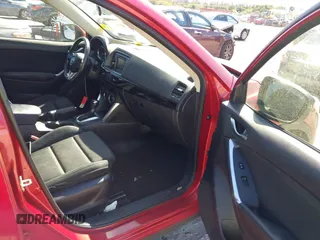 2015 Mazda CX-5 Touring with VIN JM3KE2CY5F0542184, listed as a IAAI auction lot 41770264 with 119,592 mi miles. Bid and sale history available at carsss.com. Image 5.