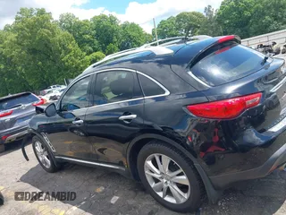 2015 Infiniti QX70 z VIN JN8CS1MW9FM483358, wystawiony jako IAAI lot #42194570 z przebiegiem 86 168 mil mil oraz . Historia ofert i sprzedaży dostępna na DreamBid. Obrazek 14.