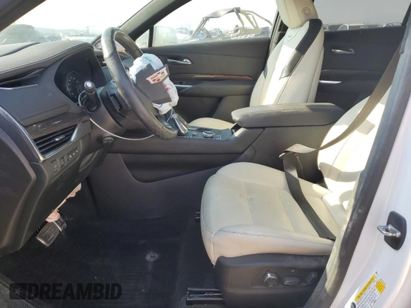 2021 Cadillac XT4 AWD Sport with VIN 1GYFZFR43MF032608, listed as a Copart auction lot 74906524 with 55,751 mi miles and Salvage title. Bid and sale history available at DreamBid. Image 7.