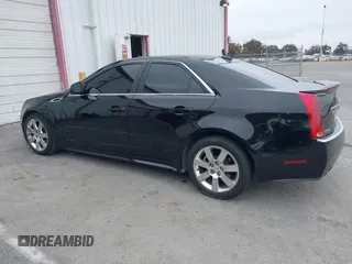 2011 Cadillac CTS Luxury with VIN 1G6DF5EYXB0103430, listed as a IAAI auction lot 42105337 with 205,069 mi miles and . Bid and sale history available at DreamBid. Image 14.