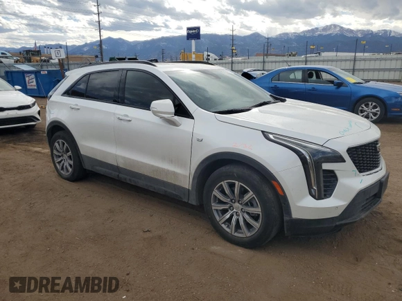 2022 Cadillac XT4 FWD Sport z VIN 1GYFZER47NF165920, wystawiony jako Copart lot #50389935 z przebiegiem 57 410 mil mil oraz Szkoda całkowita • Salvage title. Historia ofert i sprzedaży dostępna na DreamBid. Obrazek 4.