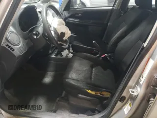 2011 Suzuki SX4 LE with VIN JS2YC5A21B6300076, listed as a Copart auction lot 83118734 with 213,177 mi miles and Salvage Title. Bid and sale history available at carsss.com. Image 7.