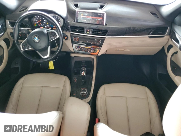 2021 BMW X1 sDrive28i z VIN WBXJG7C02M5S30154, wystawiony jako Copart lot #56076565 z przebiegiem 57 671 mil mil oraz Tytuł czysty. Historia ofert i sprzedaży dostępna na DreamBid. Obrazek 8.
