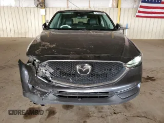 2020 Mazda CX-5 Touring with VIN JM3KFACM6L0804410, listed as a Copart auction lot 51009465 with 55,498 mi miles and Salvage Title. Bid and sale history available at carsss.com. Image 5.