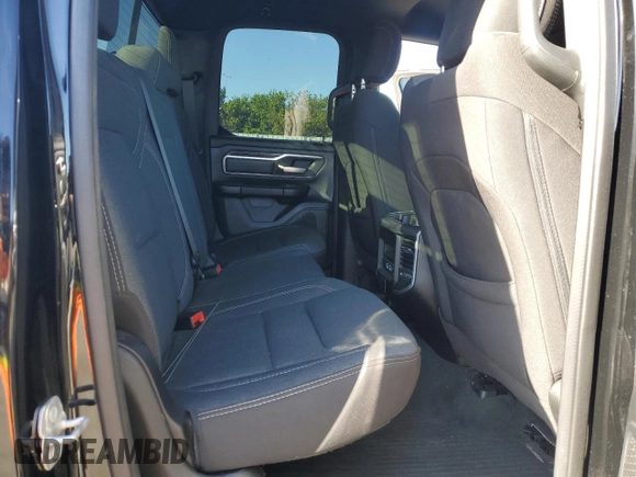 2023 Ram 1500 Lone Star with VIN 1C6RREBTXPN553048, listed as a Copart auction lot 46255525 with 59,497 mi miles and Salvage Title. Bid and sale history available at carsss.com. Image 10.