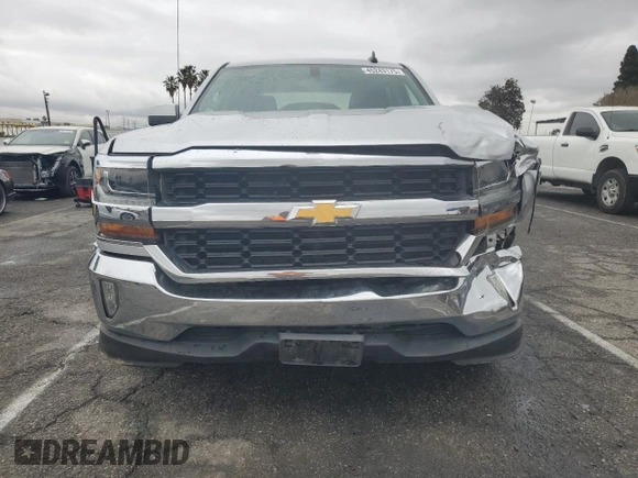 2017 Chevrolet Silverado 1500 LT with VIN 1GCPCREC7HF142769, listed as a Copart auction lot 45243175 with 188,038 mi miles and Salvage Title. Bid and sale history available at DreamBid. Image 5.