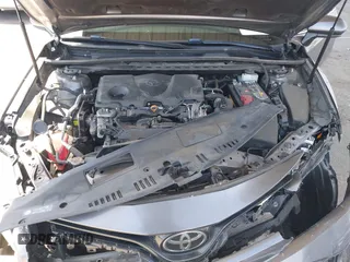 2019 Toyota Camry LE with VIN 4T1B11HK8KU204599, listed as a IAAI auction lot 42096889 with 76,518 mi miles and . Bid and sale history available at DreamBid. Image 10.