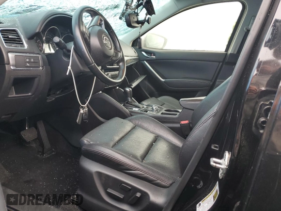 2016 Mazda CX-5 Grand Touring with VIN JM3KE4DYXG0711367, listed as a Copart auction lot 52862405 with 87,870 mi miles and Salvage Title. Bid and sale history available at DreamBid. Image 7.