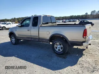 1999 Ford F-150 XL with VIN 1FTRX18LXXNA59898, listed as a Copart auction lot 49326055 with 0 mi miles and Salvage Title. Bid and sale history available at carsss.com. Image 2.