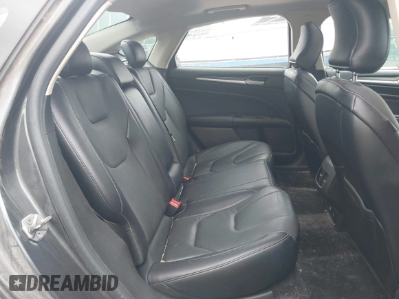 2017 Ford Fusion Titanium with VIN 3FA6P0K96HR208757, listed as a IAAI auction lot 42400172 with 90,000 mi miles and . Bid and sale history available at DreamBid. Image 8.