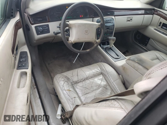 1999 Cadillac Eldorado z VIN 1G6EL12Y5XU600699, wystawiony jako Copart lot #88164505 z przebiegiem 140 075 mil mil oraz Szkoda całkowita • Salvage title. Historia ofert i sprzedaży dostępna na DreamBid. Obrazek 8.