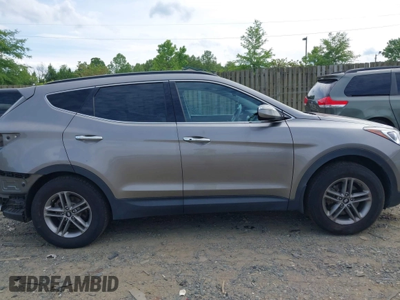 2018 Hyundai Santa Fe 2.4L z VIN 5NMZUDLB4JH073857, wystawiony jako IAAI lot #42200208 z przebiegiem 127 038 mil mil oraz . Historia ofert i sprzedaży dostępna na DreamBid. Obrazek 14.