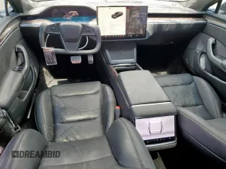 2023 Tesla Model S with VIN 5YJSA1E59PF512318, listed as a Copart auction lot 58377895 with 34,402 mi miles and Salvage title. Bid and sale history available at DreamBid. Image 8.