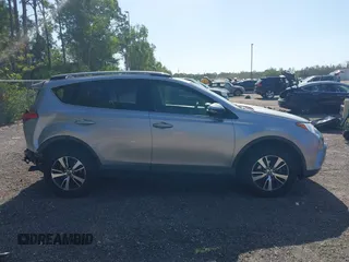 2018 Toyota RAV4 XLE with VIN JTMWFREV9JJ203353, listed as a IAAI auction lot 42129995 with 41,806 mi miles and . Bid and sale history available at DreamBid. Image 14.