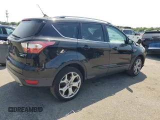 2018 Ford Escape Titanium with VIN 1FMCU9J97JUB94406, listed as a Copart auction lot 66663215 with 96,482 mi miles and Salvage title. Bid and sale history available at DreamBid. Image 3.