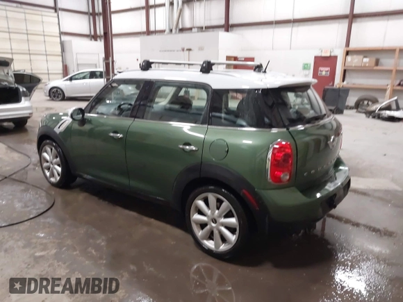 2015 MINI Countryman with VIN WMWZB3C50FWR43714, listed as a IAAI auction lot 41589778 with 93,404 mi miles and . Bid and sale history available at DreamBid. Image 3.