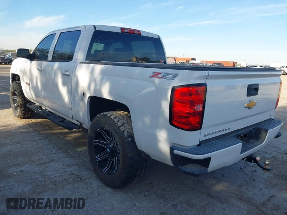 2017 Chevrolet Silverado 1500 LT with VIN 3GCUKREC4HG466329, listed as a IAAI auction lot 41305052 with 57,844 mi miles and . Bid and sale history available at DreamBid. Image 3.