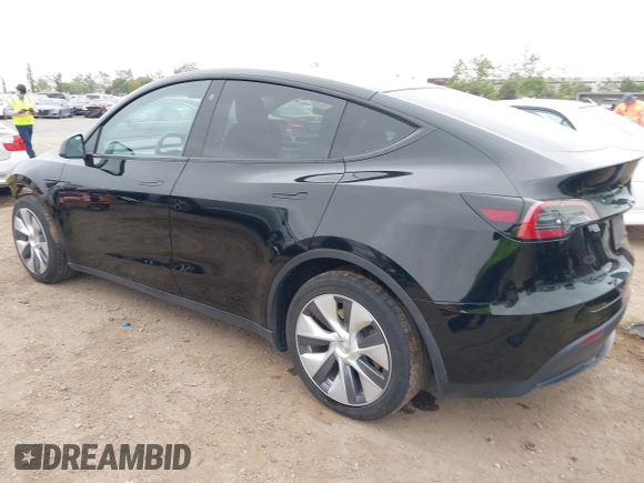 2023 Tesla Model Y Long Range with VIN 7SAYGDEEXPA044335, listed as a IAAI auction lot 42350159 with 26,731 mi miles and . Bid and sale history available at DreamBid. Image 3.
