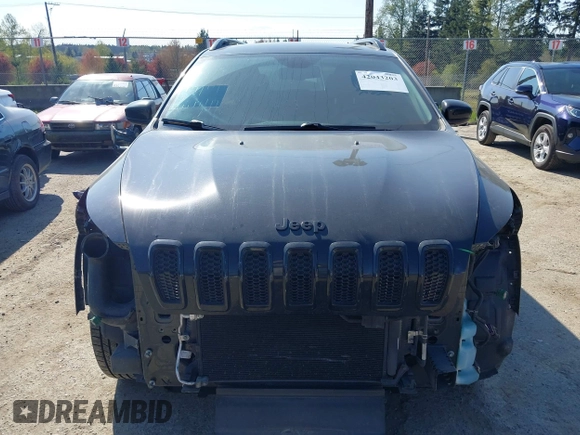 2015 Jeep Cherokee North with VIN 1C4PJMCS3FW777973, listed as a IAAI auction lot 42043203 with 158,536 mi miles. Bid and sale history available at carsss.com. Image 13.