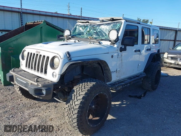 2016 Jeep Wrangler Unlimited Sahara with VIN 1C4BJWEG5GL243004, listed as a IAAI auction lot 40438321 with 121,360 mi miles and . Bid and sale history available at DreamBid. Image 17.