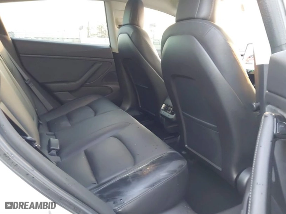 2018 Tesla Model 3 Long Range Battery with VIN 5YJ3E1EA1JF164821, listed as a IAAI auction lot 41277446 with 31,602 mi miles. Bid and sale history available at carsss.com. Image 8.