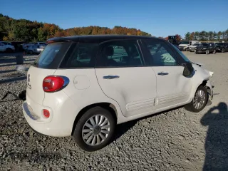 2014 FIAT 500L Easy z VIN ZFBCFABH4EZ023856, wystawiony jako Copart lot #76285024 z przebiegiem 131 343 mil mil oraz Szkoda całkowita • Salvage title. Historia ofert i sprzedaży dostępna na DreamBid. Obrazek 3.