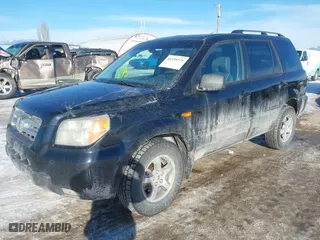 2006 Honda Pilot EX-L with VIN 2HKYF18536H526013, listed as a IAAI auction lot 41335771 with 223,265 mi miles. Bid and sale history available at carsss.com. Image 2.