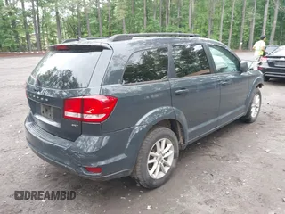 2018 Dodge Journey SXT z VIN 3C4PDCBB7JT409958, wystawiony jako IAAI lot #42200397 z przebiegiem 146 306 mil mil oraz . Historia ofert i sprzedaży dostępna na DreamBid. Obrazek 4.
