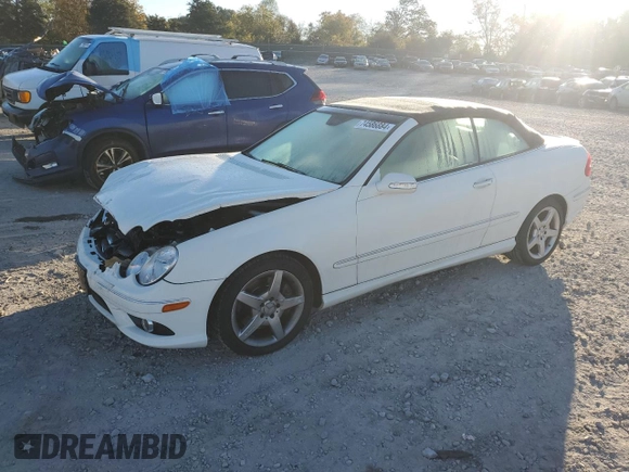 2009 Mercedes-Benz CLK-Class 3.5L with VIN WDBTK56FX9T108328, listed as a Copart auction lot 74586884 with 49,660 mi miles and Salvage Title. Bid and sale history available at carsss.com. Image 1.