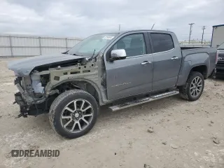 2021 GMC Canyon 4WD Denali z VIN 1GTG6EEN7M1151917, wystawiony jako Copart lot #82189584 z przebiegiem 55 898 mil mil oraz Szkody całkowita. Historia ofert i sprzedaży dostępna na DreamBid. Obrazek 1.