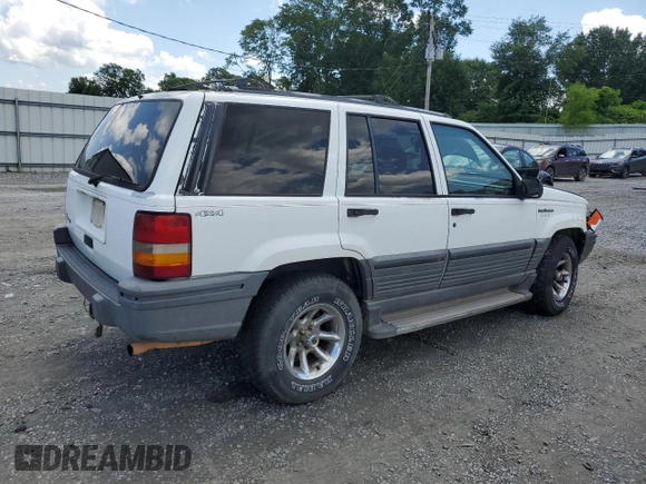 1995 Jeep Grand Cherokee Laredo с VIN 1J4GZ58S5SC724222, выставлен на аукционе Copart как лот 57837155 с пробегом 246 303 миль миль и Списание • Salvage title. История ставок и продаж доступна на DreamBid. Изображение 3.