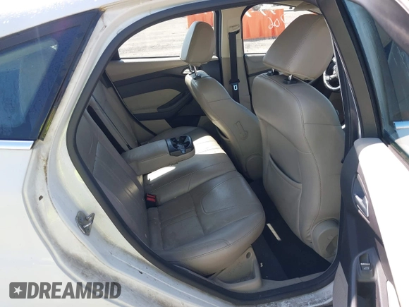 2012 Ford Focus SEL with VIN 1FAHP3M21CL413436, listed as a IAAI auction lot 42011706 with 392,754 mi miles. Bid and sale history available at carsss.com. Image 8.