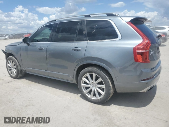 2017 Volvo XC90 Momentum with VIN YV4A22PK8H1173169, listed as a Copart auction lot 56561005 with 105,622 mi miles and Salvage Title. Bid and sale history available at DreamBid. Image 2.