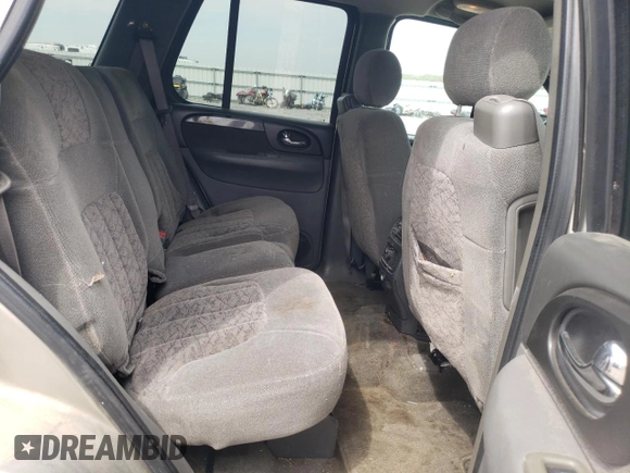 2003 GMC Envoy SLE z VIN 1GKDT13S332365071, wystawiony jako Copart lot #52811295 z przebiegiem Nie podano mil oraz Szkoda całkowita • Salvage title. Historia ofert i sprzedaży dostępna na DreamBid. Obrazek 11.
