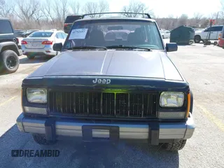 1996 Jeep Cherokee SE z VIN 1J4FJ28S2TL128682, wystawiony jako IAAI lot #41752453 z przebiegiem 270 167 mil mil oraz . Historia ofert i sprzedaży dostępna na DreamBid. Obrazek 6.