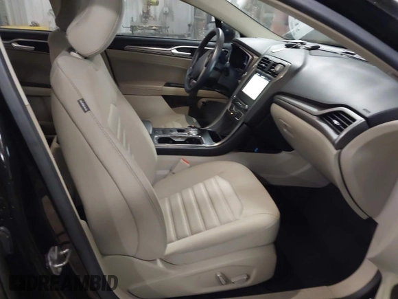 2018 Ford Fusion SE z VIN 3FA6P0LU3JR203864, wystawiony jako IAAI lot #41476335 z przebiegiem 49 246 mil mil oraz . Historia ofert i sprzedaży dostępna na DreamBid. Obrazek 5.