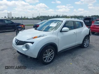 2013 Nissan Juke S with VIN JN8AF5MR2DT205370, listed as a IAAI auction lot 42055335 with 115,390 mi miles. Bid and sale history available at carsss.com. Image 2.